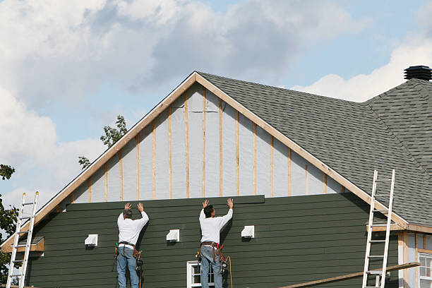 Professional Siding Installation technician working in Brownsville, TN